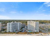 Gorgeous aerial view of this beachfront condo community, with pools, beach access and beautiful views at 158 Seawatch Dr. # 905, Myrtle Beach, SC 29572