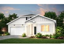 Charming, new construction two-story home with a well-manicured lawn and attached garage at 5012 Neverland Ct, Myrtle Beach, SC 29588