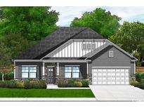 Charming single-story home featuring stone accents, a two-car garage, and a beautifully landscaped front yard at 986 Oak Hollow St., Longs, SC 29568
