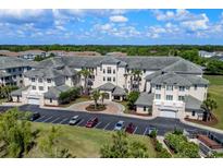 Beautiful multi-story condo building with manicured landscaping and ample parking at 2180 Waterview Dr. # 835, North Myrtle Beach, SC 29582