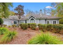 Charming single-story home with manicured landscaping and a welcoming front yard at 4956 Dory Ct., North Myrtle Beach, SC 29582