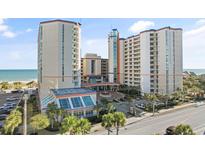 Grand oceanfront resort with stunning views, pools, and a convenient location near popular attractions and white sandy beach at 5200 N Ocean Blvd. # 631, Myrtle Beach, SC 29577