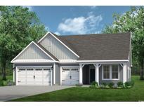 Charming single-Gathering home showcasing a two-car garage, inviting entry, and manicured lawn at 2226 Seagrape Dr., Little River, SC 29566