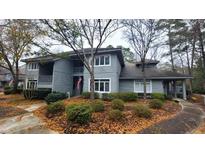 Charming two-story home with front yard landscaping and a curved walkway at 1221 Tidewater Dr. # 2821, North Myrtle Beach, SC 29582