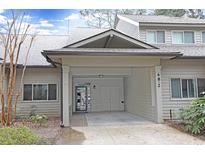 Inviting exterior of home featuring a covered carport and neutral siding at 48 Twelve Oaks Dr. # 2, Pawleys Island, SC 29585