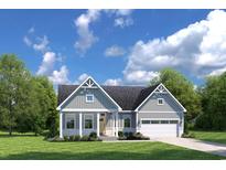 Charming single-story home featuring a covered porch, two-car garage, and beautifully landscaped front yard at 7023 Denim Loop, Myrtle Beach, SC 29579