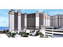 Beautiful condo exterior showing the building and landscaping at 4800 S Ocean Blvd. # 1514, North Myrtle Beach, SC 29582