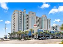 Stunning exterior view of the building complex, showcasing the beautiful architecture and surrounding palm trees at 2311 S Ocean Blvd. # 969, Myrtle Beach, SC 29577