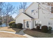 Inviting two-story home featuring a quaint walkway and charming front entrance, enhancing curb appeal at 118 Gully Branch Ln. # 3, Myrtle Beach, SC 29572