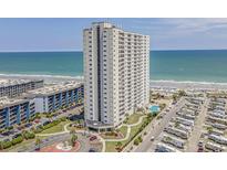 Expansive view of the high rise condo building, beach, pool, and campground at 5905 S Kings Hwy. # 1616, Myrtle Beach, SC 29575