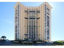 Stunning exterior shot of the beachfront high-rise condo community with well-manicured landscaping at 9650 Shore Dr. # 503, Myrtle Beach, SC 29572