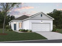 Charming single-story home with white siding, well-maintained landscaping, and an attached two-car garage at 1000 Cavaletti Ct., Myrtle Beach, SC 29588