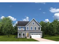 Charming two-story home featuring gray siding, white trim, and an attached two-car garage at 2254 Hazel Way, Longs, SC 29568