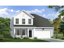 Charming two-story home with light-blue siding, a black door, and an attached garage at 467 Joseph St, Longs, SC 29568