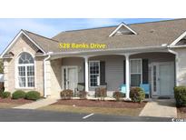 Charming single-story home with manicured front yard and inviting entrance at 528 Banks Dr. # 2-4 & 2-4G, Myrtle Beach, SC 29588