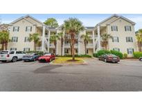Inviting condominium complex featuring manicured landscaping and ample parking for residents and guests at 601 Hillside Dr. # 4233, North Myrtle Beach, SC 29582