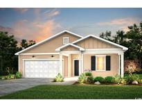 Charming single-story home with a two-car garage, manicured lawn, and welcoming front porch at 981 Laconic Dr., Myrtle Beach, SC 29588
