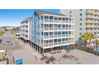 Beautiful multifamily condo with private balconies and beach access, featuring an elevator for easy access and plenty of parking at 1000 N Waccamaw Dr. # 205, Murrells Inlet, SC 29576