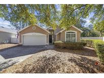 Charming one-story home with a two-car garage and well-maintained landscaping at 1201 Trisail Ln, North Myrtle Beach, SC 29582