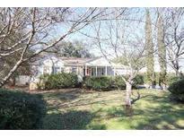 Charming single-story home with mature landscaping in the front yard at 1841 Jasper St., Georgetown, SC 29440