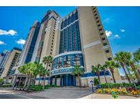 Beautiful exterior of The Breakers resort with well-maintained landscaping and clear blue sky at 2006 N Ocean Blvd. # 876, Myrtle Beach, SC 29577