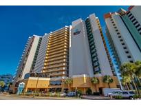 Stunning exterior of the Patricia Grand Resort with bright blue skies on a sunny day at 2710 N Ocean Blvd. # 308, Myrtle Beach, SC 29577