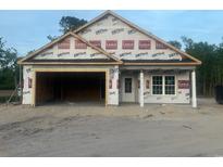 New home featuring an attached garage and covered entrance ready to be personalized to make it your dream home at 3186 Wayside Rd., Conway, SC 29527
