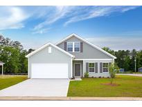 Charming single-Gathering home with manicured lawn, a two-car garage and inviting curb appeal at 491 Wagner Cir., Conway, SC 29526
