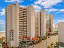 Exterior of a multi-story condo building with ocean views and balcony access at 1625 S Ocean Blvd. # 1810, North Myrtle Beach, SC 29582