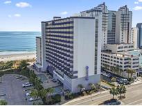 A resort with multiple balconies near the beach has access to a pool and parking at 2001 S Ocean Blvd. # 209, Myrtle Beach, SC 29577