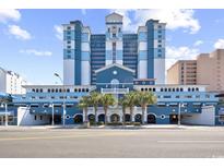 Striking view of the Paradise Resort featuring a blue and white color scheme with parking entrance at 2201 S Ocean Blvd. # 805, Myrtle Beach, SC 29577