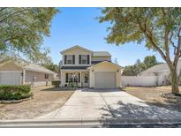 Charming two-story home with a well-manicured lawn and attached garage at 813 Silvercrest Dr., Myrtle Beach, SC 29579