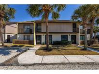 Charming two-story townhome featuring a private balcony and brick accents at 10200 Lake Shore Dr. # 16, Myrtle Beach, SC 29572
