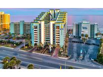 Bright, tiered beachfront resort condo complex with ocean views and prominent signage at 6804 N Ocean Blvd. # 631, Myrtle Beach, SC 29572
