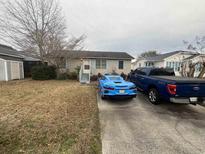 Charming single-story home with a driveway and curb appeal at 842 Keel Ct., Murrells Inlet, SC 29576