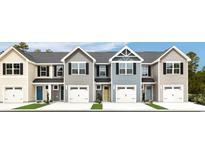 Charming townhomes featuring various siding colors, one-car garages, and manicured lawns at 269 Christiana Ln. # D, Myrtle Beach, SC 29579
