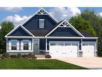 Charming two-story home featuring a blue exterior, white trim, stone accents, and a spacious two-car garage at 7019 Denim Loop, Myrtle Beach, SC 29579