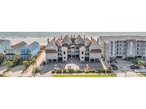 Stunning aerial view of a multi-Gathering condo community near the beach, complete with convenient parking at 1113 N Ocean Blvd. # 101, Surfside Beach, SC 29575