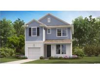 Charming two-story home featuring a light blue exterior, attached garage, and well-manicured landscaping at 415 Falling Leaf Loop, Myrtle Beach, SC 29588