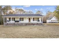 Charming single-story home with a welcoming front porch and swing at 4887 Pee Dee Hwy., Conway, SC 29527
