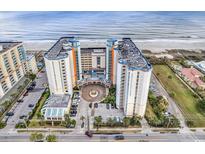 Stunning aerial view of the oceanfront resort, showcasing its beautiful architecture and proximity to the beach at 5200 Ocean Blvd. N # 855, Myrtle Beach, SC 29577