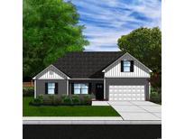 Charming single-Gathering home with a well-manicured lawn, two-car garage, and beautifully landscaped front yard at 8545 Pee Dee Hwy., Conway, SC 29527