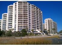 Stunning multi-story beachfront condos with private balconies and lush landscape at 101 Ocean Creek Dr. # Mm-5, Myrtle Beach, SC 29572
