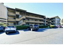 Attractive condo complex with multiple levels, private balconies and parking area for residents and guests at 9501 Shore Dr. # D-337, Myrtle Beach, SC 29572
