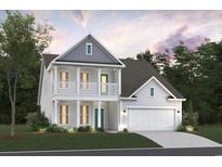 Charming two-story home with a welcoming front porch and a two-car garage at 2520 Brescia St., Myrtle Beach, SC 29579