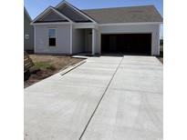New construction home featuring a two-car garage and concrete driveway at 5419 Shelly Lynn Dr., Myrtle Beach, SC 29579