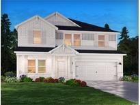 Charming two-story home with white siding, brick accents, and a well-manicured lawn at 2104 Copper Creek Ct., Longs, SC 29568