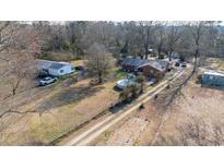 Expansive property featuring two homes, above ground pool, and plenty of land at 2945 Old Railroad Rd., Conway, SC 29527