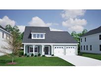 Charming home with light green siding, gray roof, dormer window, and an attached two-car garage at 1071 Laconic Dr., Myrtle Beach, SC 29588