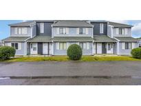 Charming townhomes with a freshly painted exterior and beautiful, well-maintained landscaping at 3700 Golf Colony Lane # 18-I, Little River, SC 29566